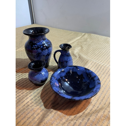 140 - Selection of blue Welsh pottery bowls 2 vases and small jug