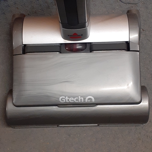 22 - Gtech Bissell Air ram. Silver colour. Model 1047N. 22.2 VDC 100w. Working order with lead/adaptor