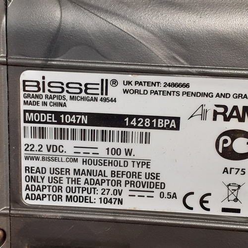 22 - Gtech Bissell Air ram. Silver colour. Model 1047N. 22.2 VDC 100w. Working order with lead/adaptor