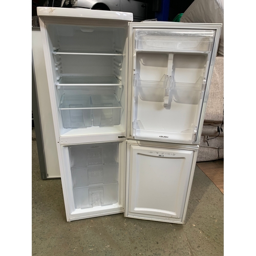 513 - Bush Fridge-Freezer. Some cosmetic damage to the bottom