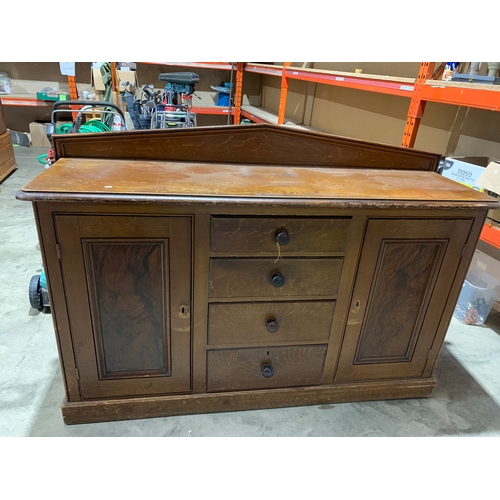 437 - Vintage Sideboard with two doors either side and four drawers in the centre. Two shelves inside both... 