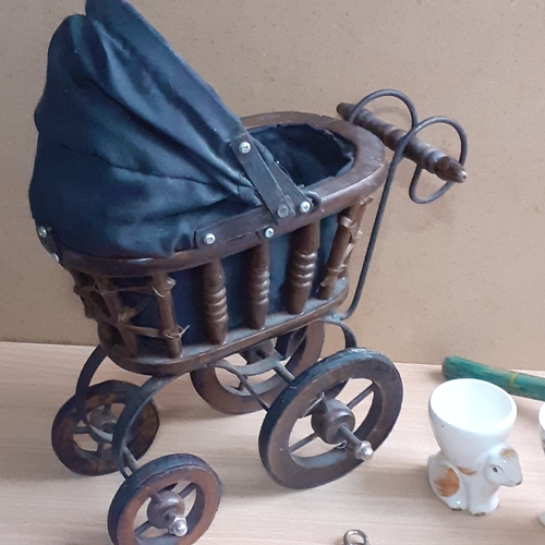 27 - Small lot of collectible vintage items. Includes a small Victorian style dolls pram, Handmade glass ... 