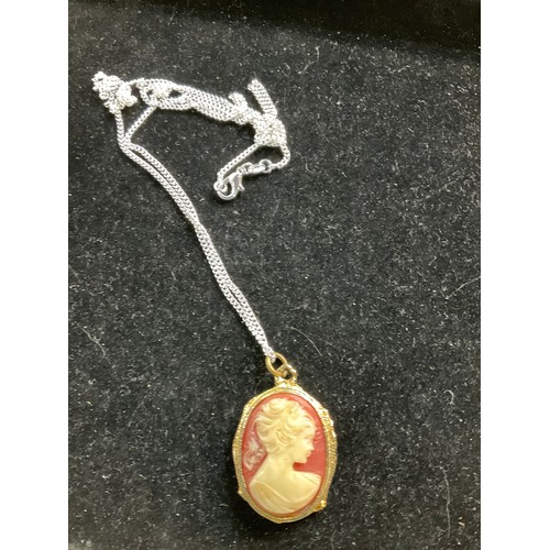 80 - 925 30” long silver chain with cameo pendant