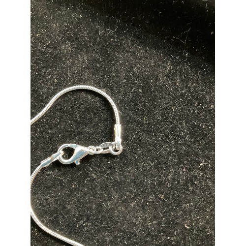 85 - 925 silver 24” chain with blue heart shaped pendant