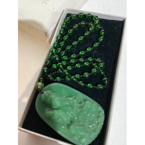 380 - Green glass bead buddha necklace