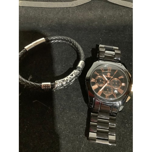 63 - Men’s heavy black stainless steel watch & a bangle