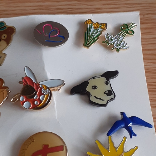 440 - A quantity of vintage and more modern, charity pin badges. Various designs from animals/cartoon type... 