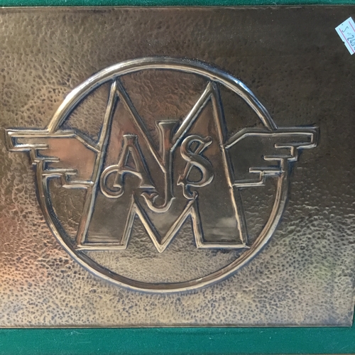 138 - Framed AJS and Matchless Emblem on Hammered Copper. 24.6x30.4cms