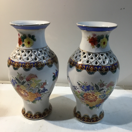 146 - Pair of Oriental-style Pierced Vases - 20cm tall