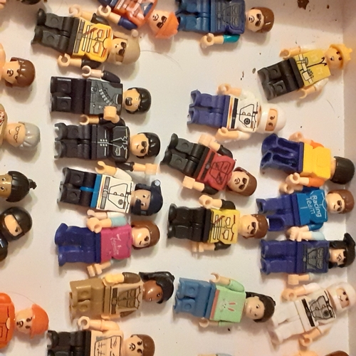 447 - Large quantity of minifigures. Lots undamaged and complete, shown in box on picture, plus a bag  of ... 