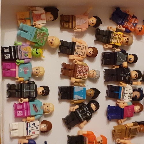 447 - Large quantity of minifigures. Lots undamaged and complete, shown in box on picture, plus a bag  of ... 