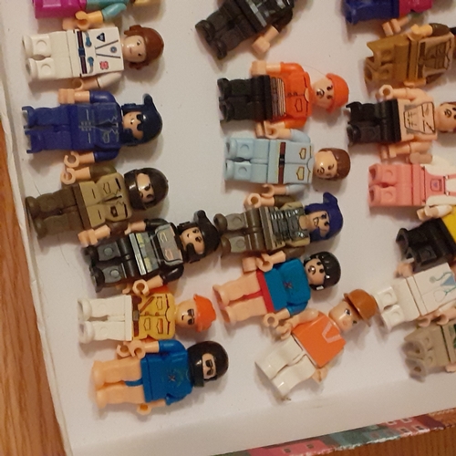 447 - Large quantity of minifigures. Lots undamaged and complete, shown in box on picture, plus a bag  of ... 