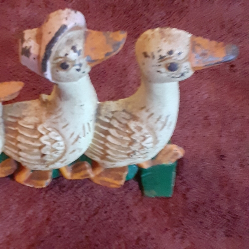 136A - Cast Iron Doorstop in family of ducks design. Solid piece, some wear but still attractive