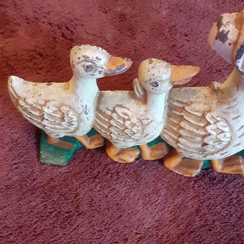 136A - Cast Iron Doorstop in family of ducks design. Solid piece, some wear but still attractive