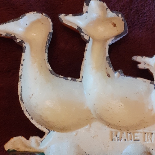 136A - Cast Iron Doorstop in family of ducks design. Solid piece, some wear but still attractive