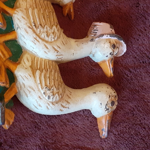 136A - Cast Iron Doorstop in family of ducks design. Solid piece, some wear but still attractive