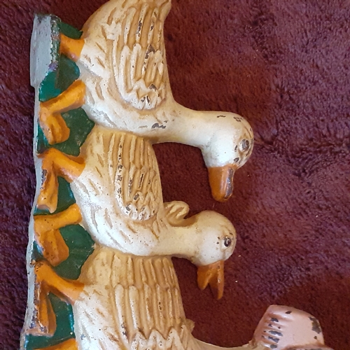 136A - Cast Iron Doorstop in family of ducks design. Solid piece, some wear but still attractive