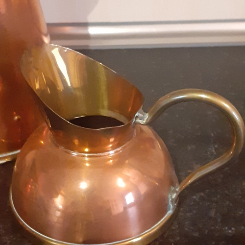 132A - 3 x Copper and Brass Pitchers/Jugs. Overall nice condition with the exception of one small dent in o... 