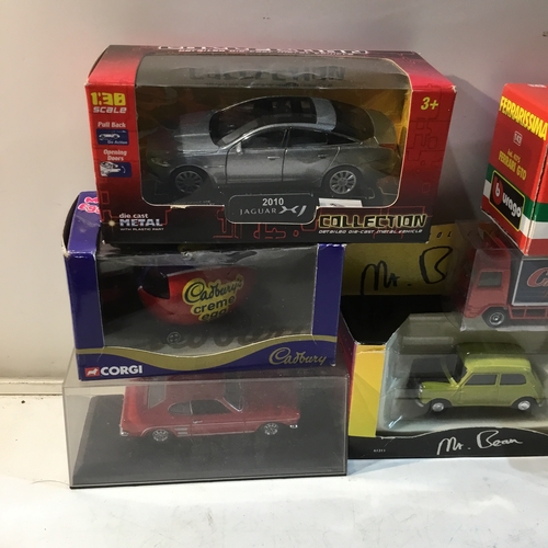 176 - Quantity of boxed die cast vehicles inc Mr Bean, Crème Egg, Burago Ferrari GTO and more