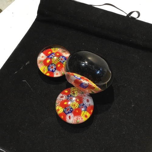 177 - Three matching miniature glass floral paper weights