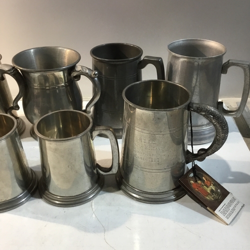 207 - Large quantity  of mainly pewter tankards