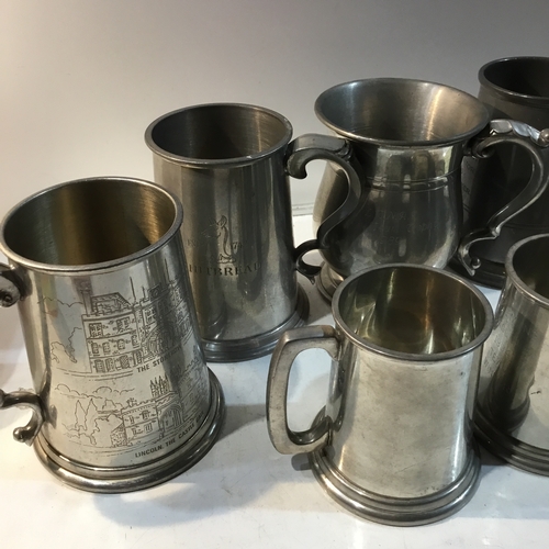 207 - Large quantity  of mainly pewter tankards