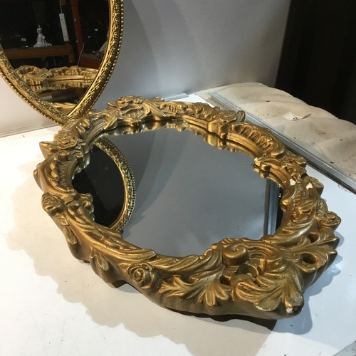 211 - Pair of gold gilt wall hanging mirrors