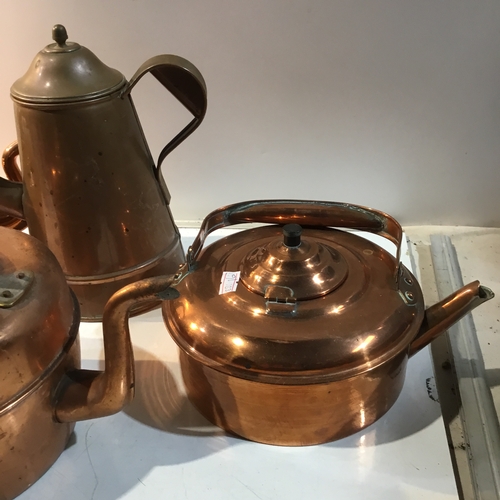 218 - Quantity of copper kettles and teapots in nice condition