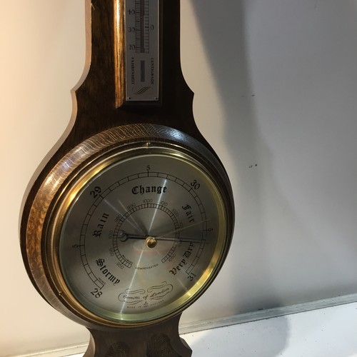 214 - Oak cased barometer in good clean condition