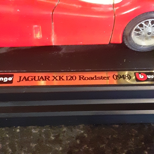 141A - Burago Jaguar XaJ120 Roadster and a Maisto Jaguar XJ220 model, scales 1/18. Played with condition wi... 