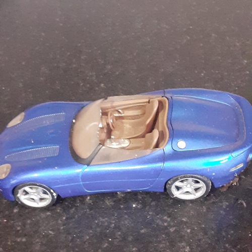 112B - Diecast Burago Jaguar 'E' type and a Jaguar XK180 by Welly. Playworn condition but no major damage w... 