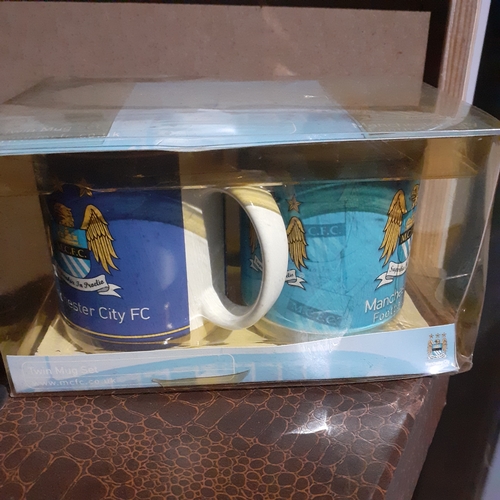 133A - Manchester City Twin Mug Set. Vintage in original packaging, look unopened. Official Manchester City... 