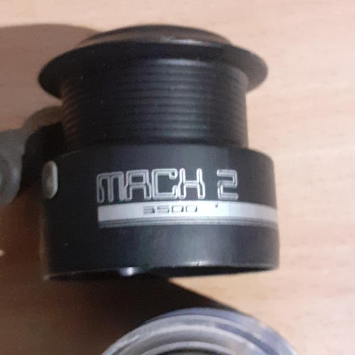 422 - Fishing reels x 2 plus spools. Mach 2 reel with 2 x Mach 2 spools amd an AVS reel. Look in largely g... 