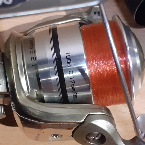 422 - Fishing reels x 2 plus spools. Mach 2 reel with 2 x Mach 2 spools amd an AVS reel. Look in largely g... 