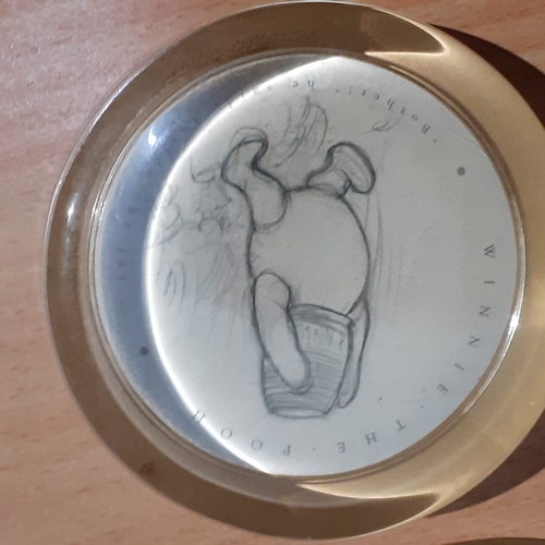 142A - 4 flat glass paperweights. Winnie the Pooh, Church, Wild bird and an embroidered one. No damage.