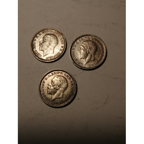 476A - COINS : 3 x silver threepenny bits dated 1934,35 and 1936