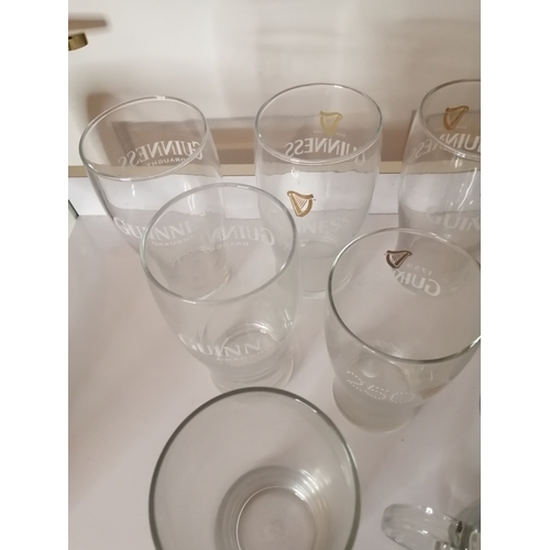 42A - Collection of 8 Guinness pint glasses and a Guinness glass tankard