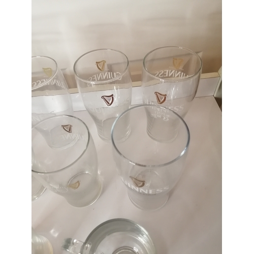 42A - Collection of 8 Guinness pint glasses and a Guinness glass tankard