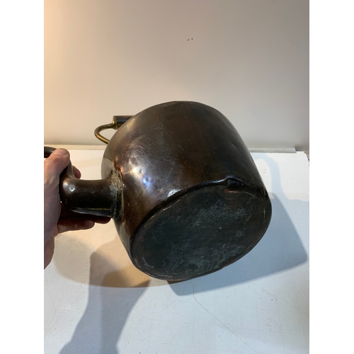 241 - Large copper kettle with brass handle