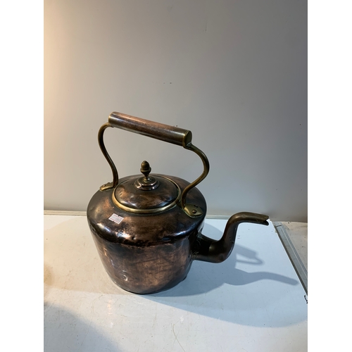 241 - Large copper kettle with brass handle