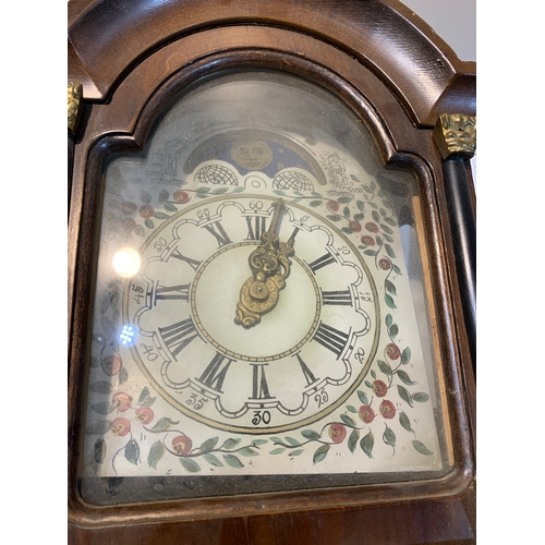 248 - Dutch brass wall clock - with weights - good condition - older clock!