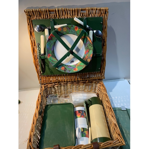 252 - Picnic hamper with green tones in wicker basket