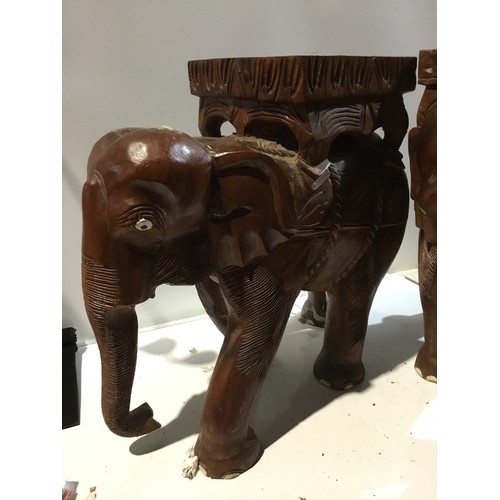 249 - Pair of matching wooden elephant stands - approx 50cm wide - good condition