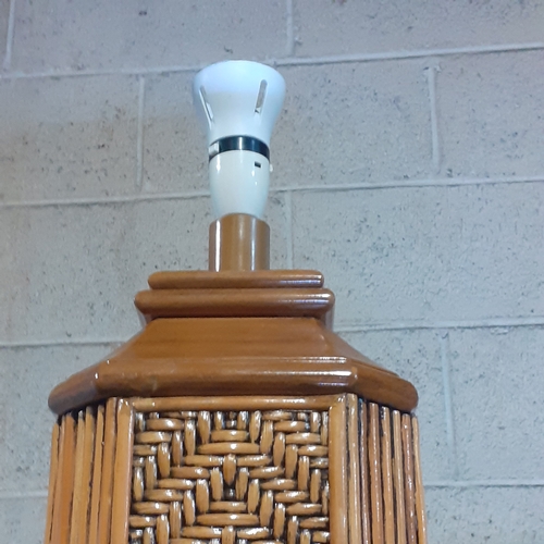 424 - Rattan style, tall, floor lamp. Nice detail. The screw at top of light bulb fixture is missing so ne... 