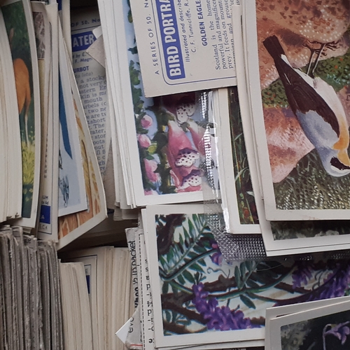 434 - Quantity of collectible postcards, cigarette cards and matchboxes. Includes some postcards which are... 