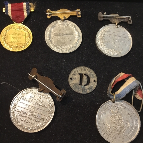 272 - Group of early 20thC medals, and a pre 1945 Notts Miners Association union badge