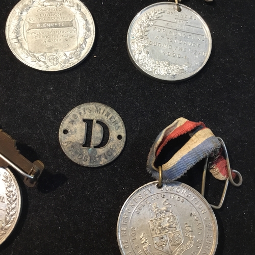 272 - Group of early 20thC medals, and a pre 1945 Notts Miners Association union badge