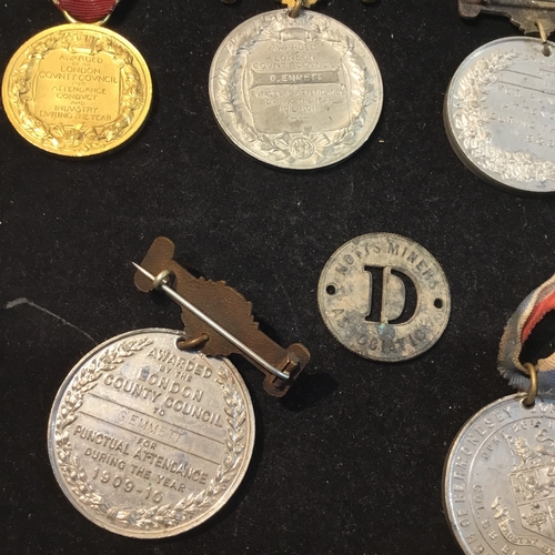 272 - Group of early 20thC medals, and a pre 1945 Notts Miners Association union badge