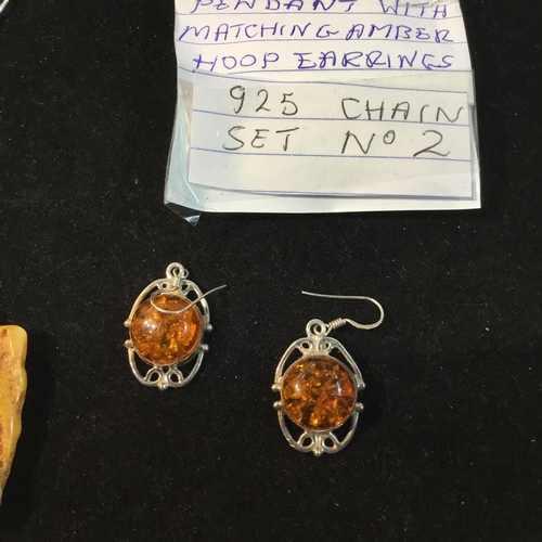 280 - Amber egg yolk pendants on 925 silver chains