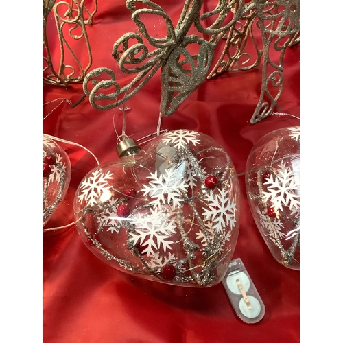 124 - Collection of light up glass hearts plus set of three silver rain deers